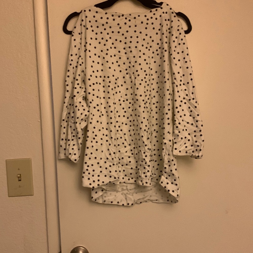 White polka dot shirt